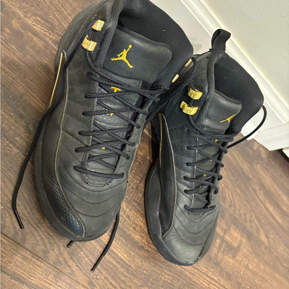 Jordan Black and Gold High-Top Sneakers